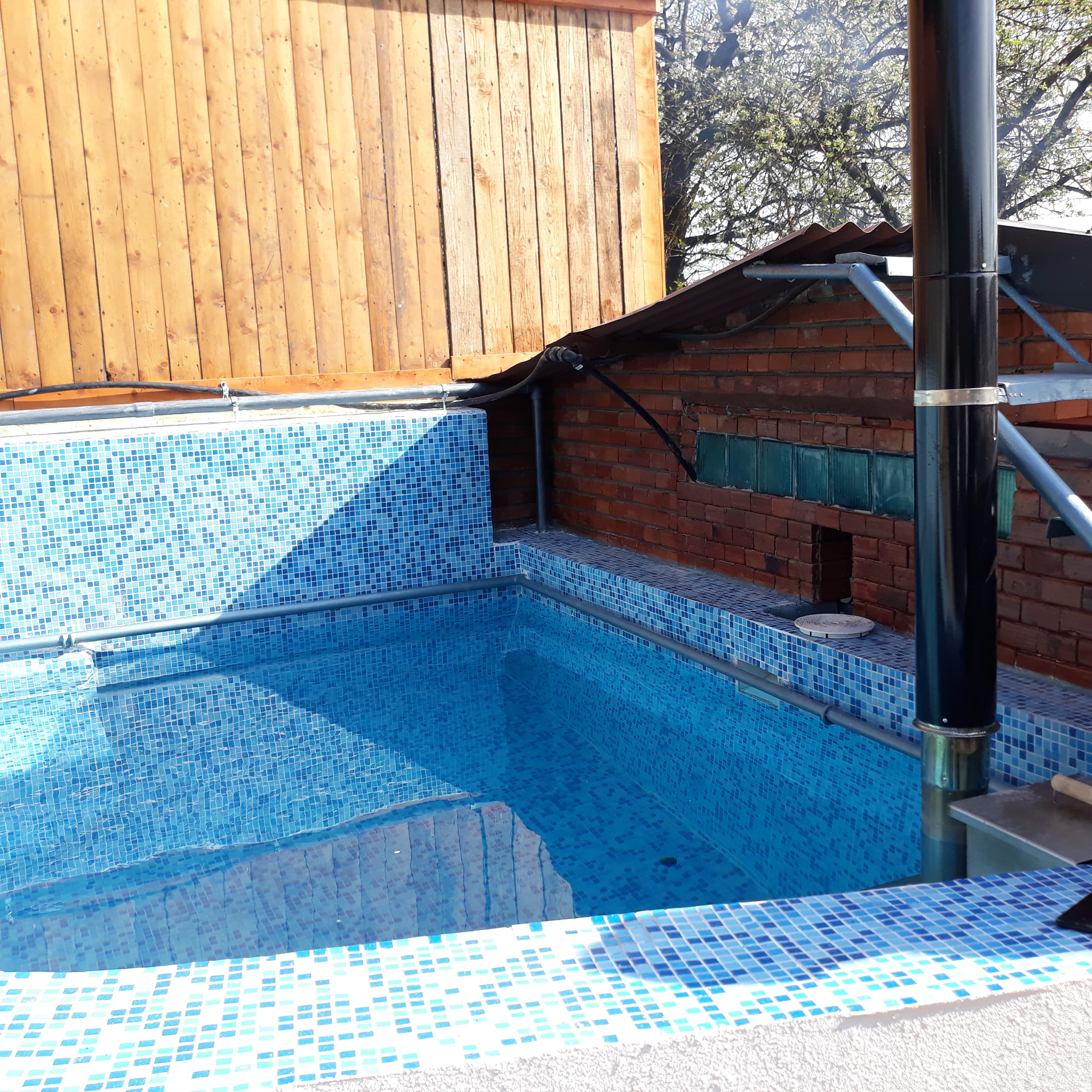 Piscina cu incalzire cu soba pe lemne